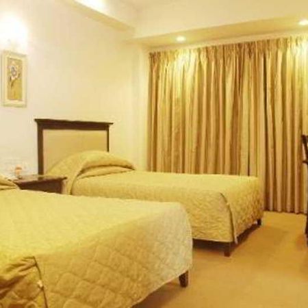 Hotel Mandakini Ambience Пуна Номер фото